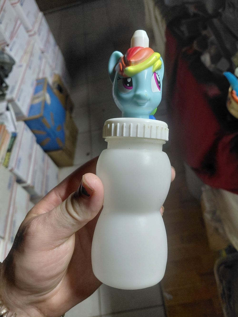 Good2Grow juice bottle featuring a My Little Pony Rainbow Dash character topper.